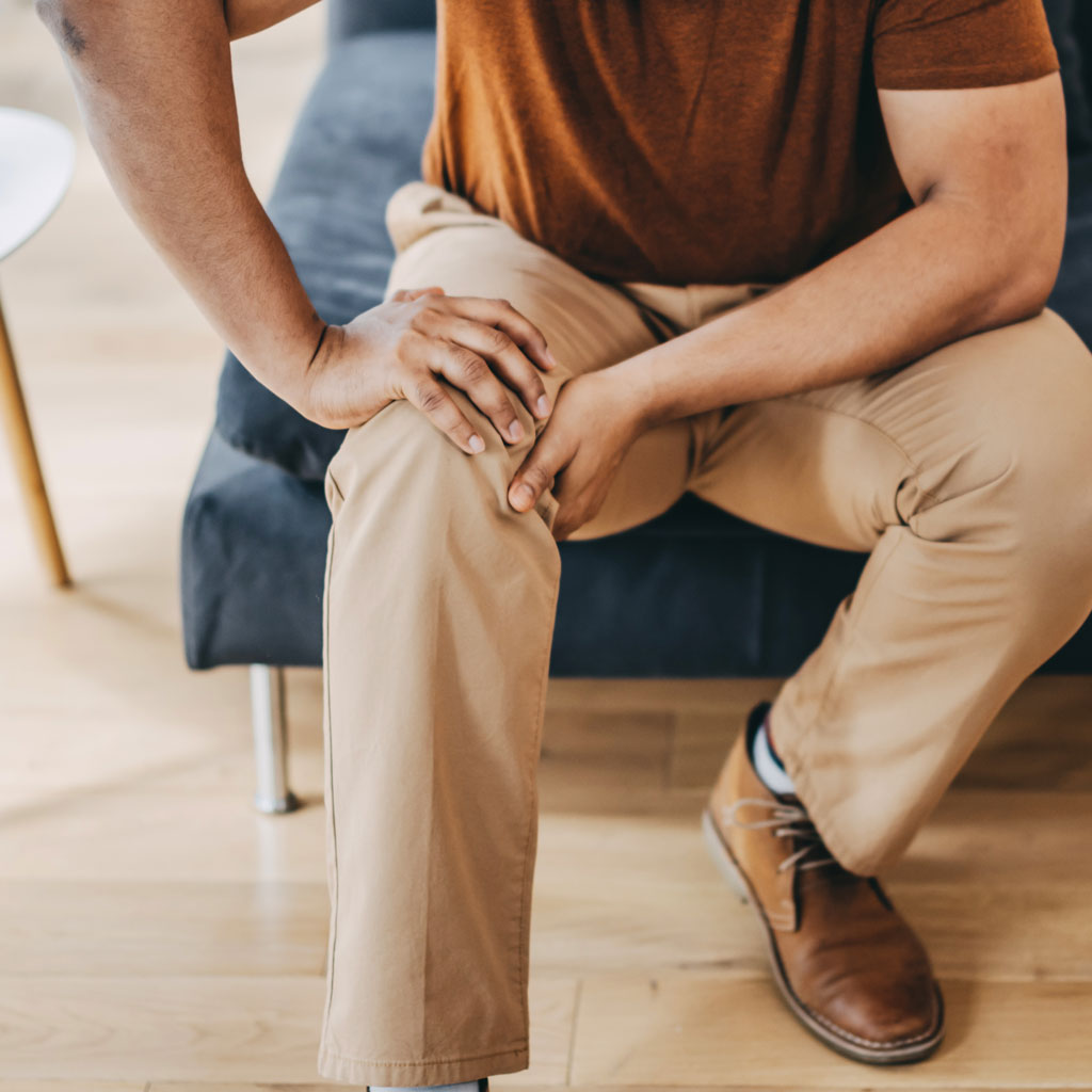Man with Knee Pain Contemplating GAE vs. Total Knee Replacement
